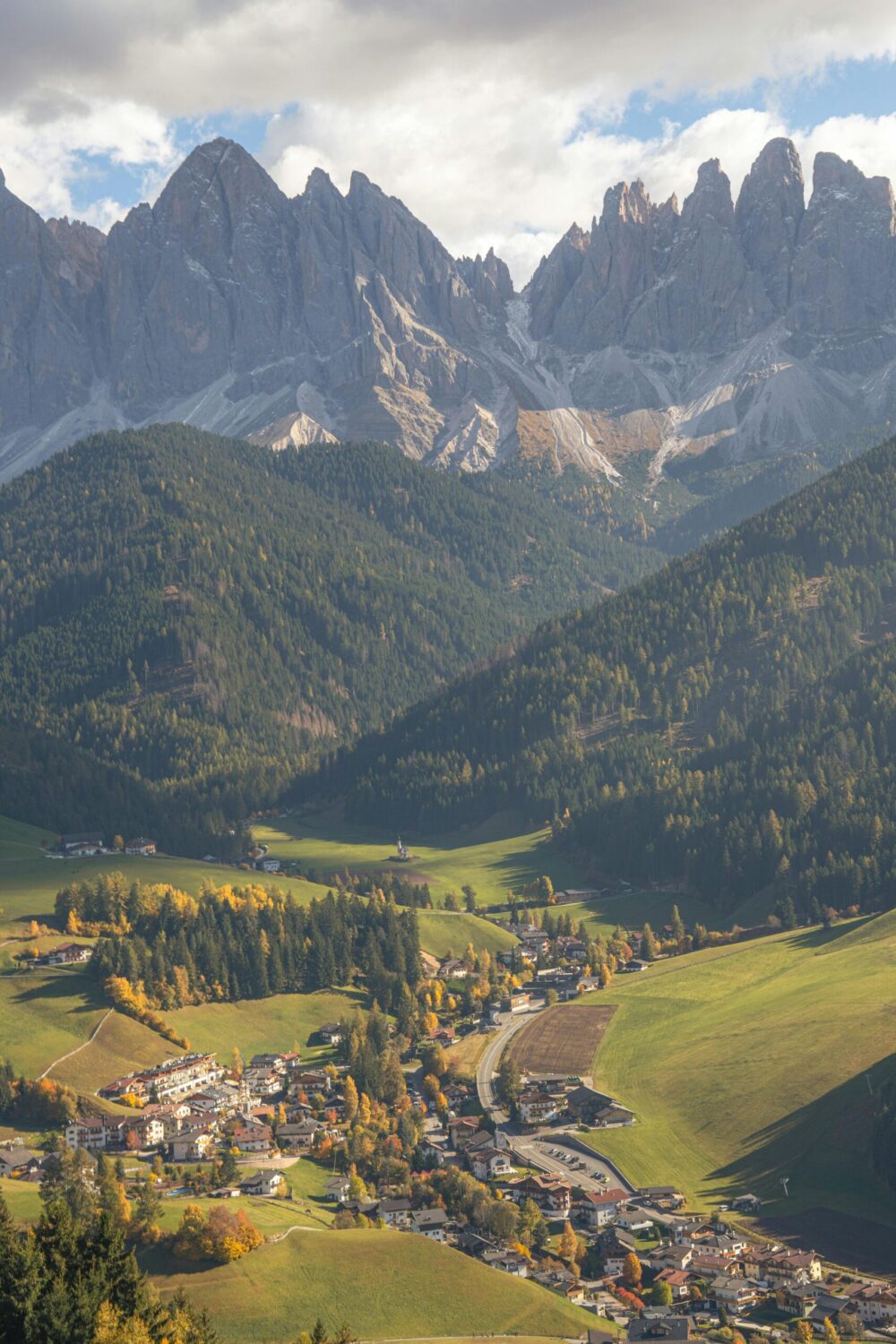 A landscape portrait image of a mountainous area.